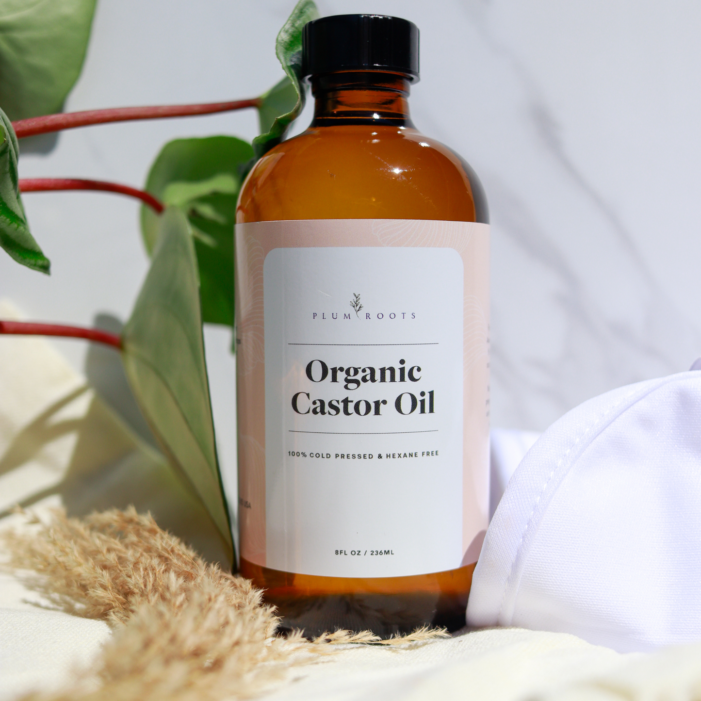 Organic Cold Pressed, Hexane Free Castor Oil in a amber glass bottle
